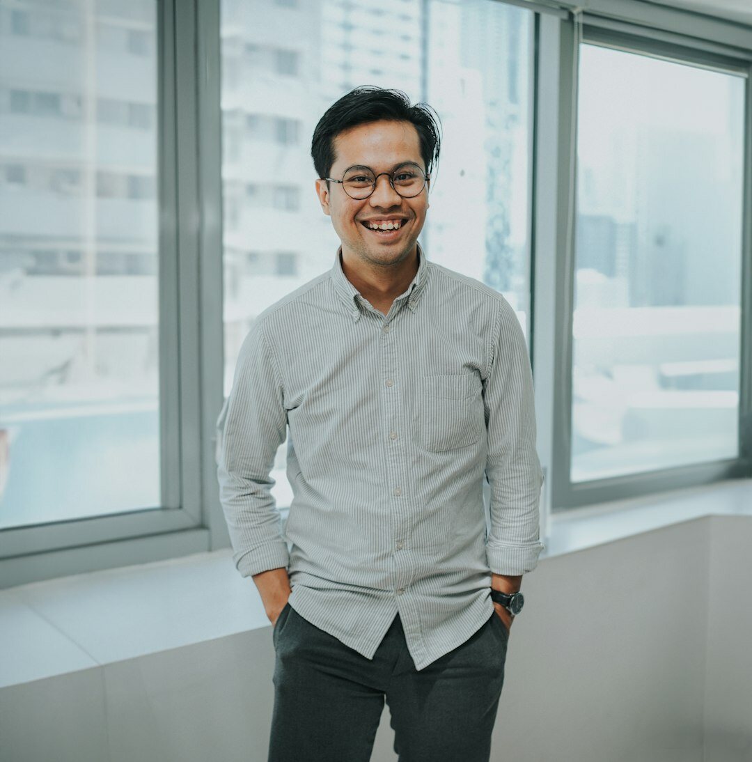Portrait of a Malaysian Chinese man, sound engineer, smiling