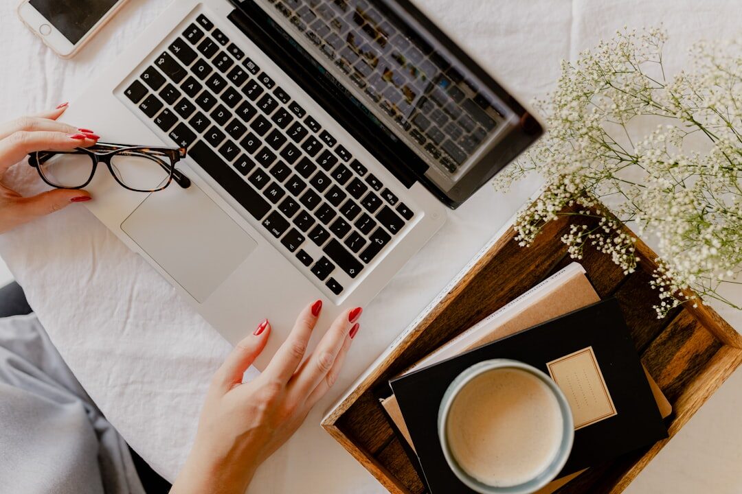 blogger writing at desk