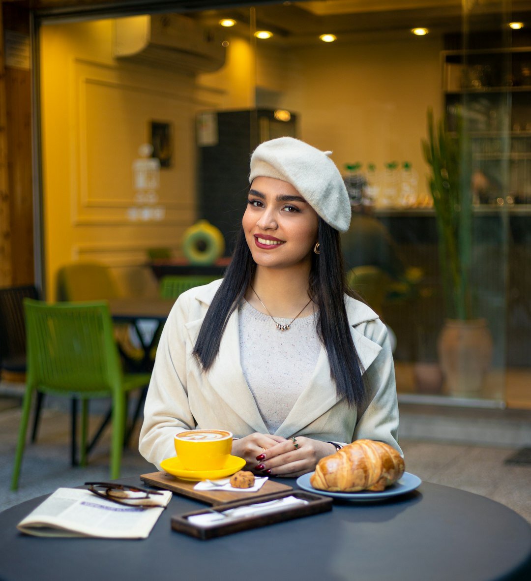 Portrait of a Malaysian Malay woman, podcast host, smiling