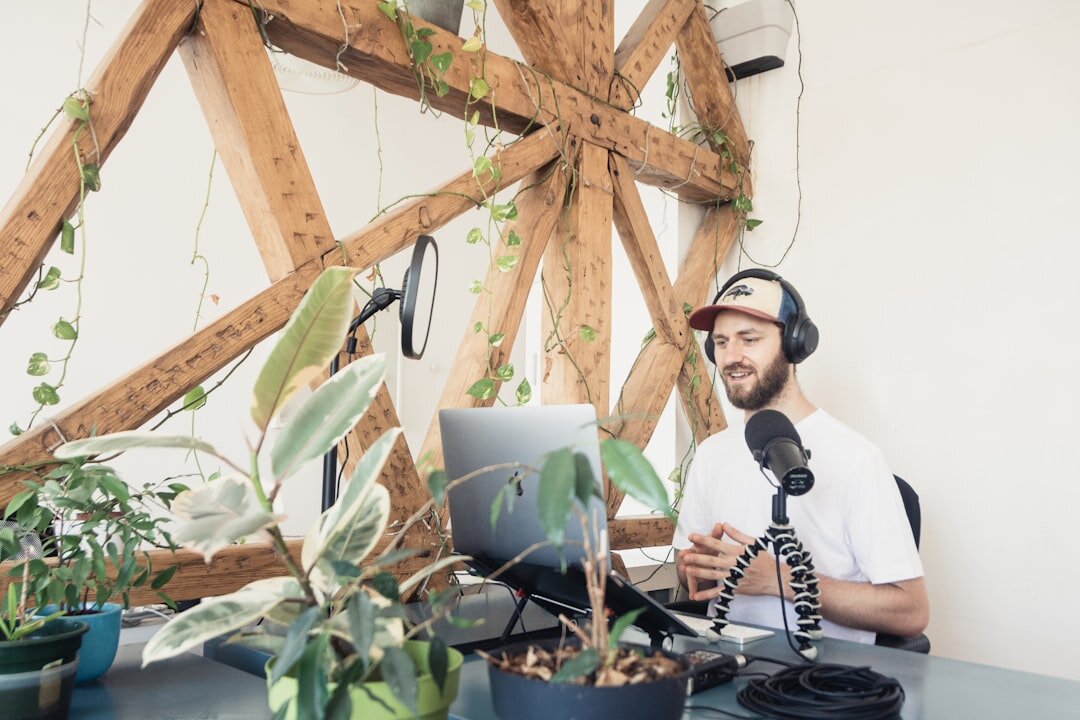 podcast host speaking into mic