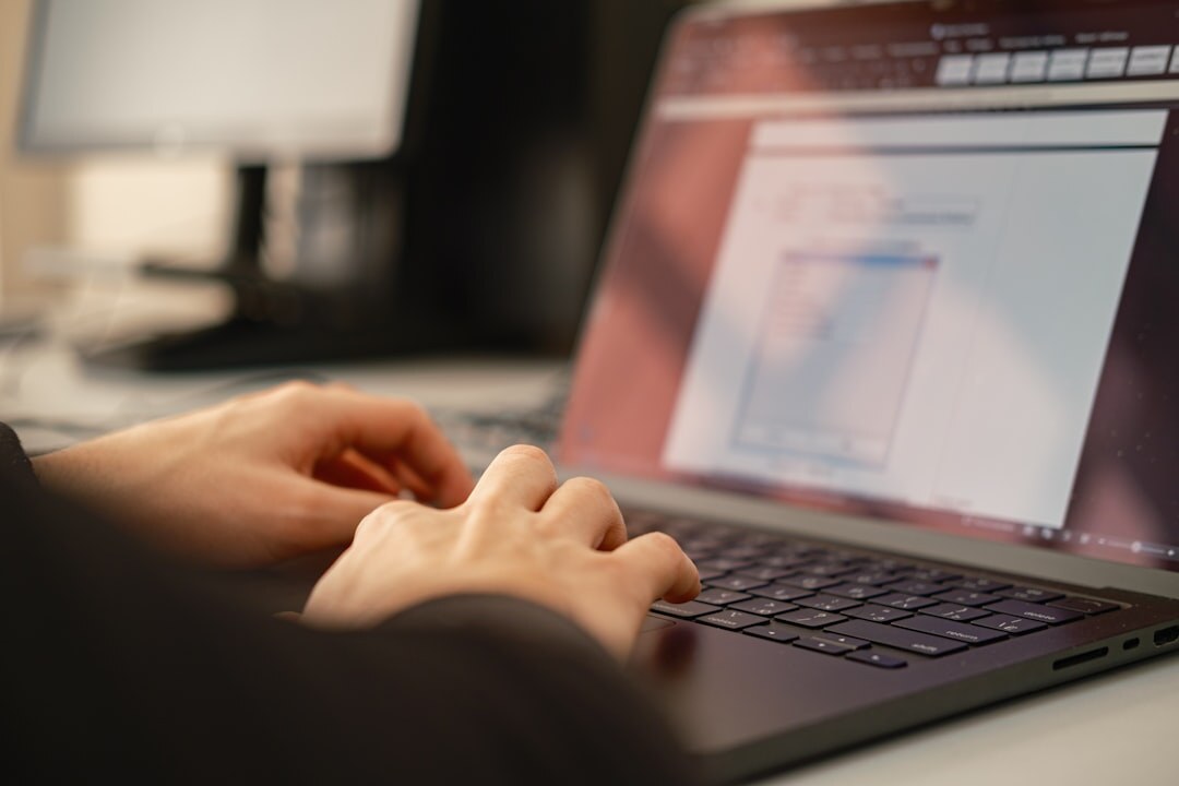 person editing blog on computer