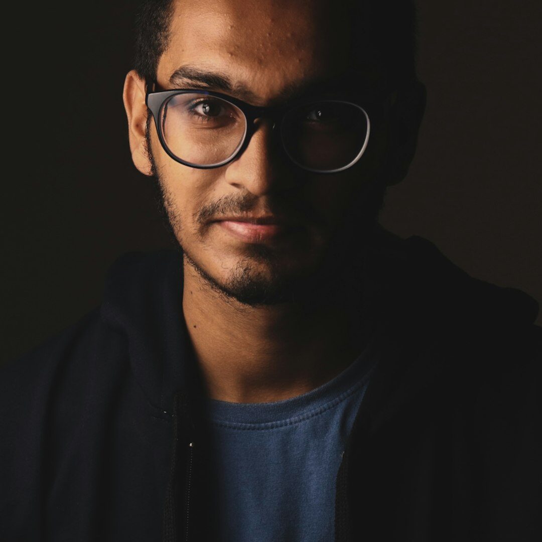 Portrait of a Malaysian Malay man, podcast producer, smiling