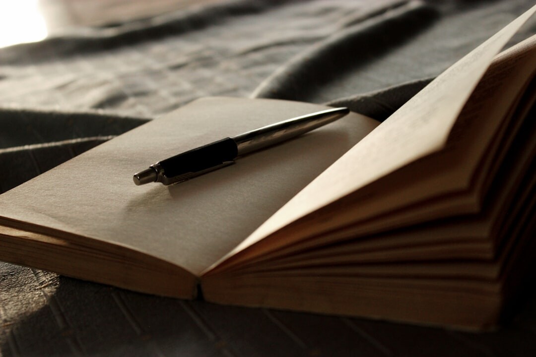 open notebook with pen
